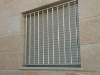 Reja de acero inoxidable para ventana con barrotes verticales